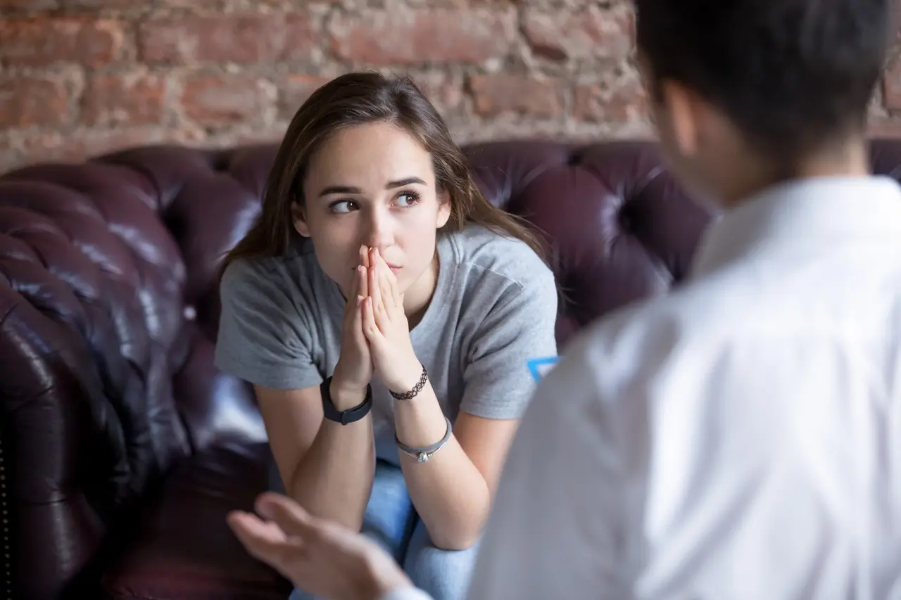 Young person in a therapy session — child and adolescent psychiatry.